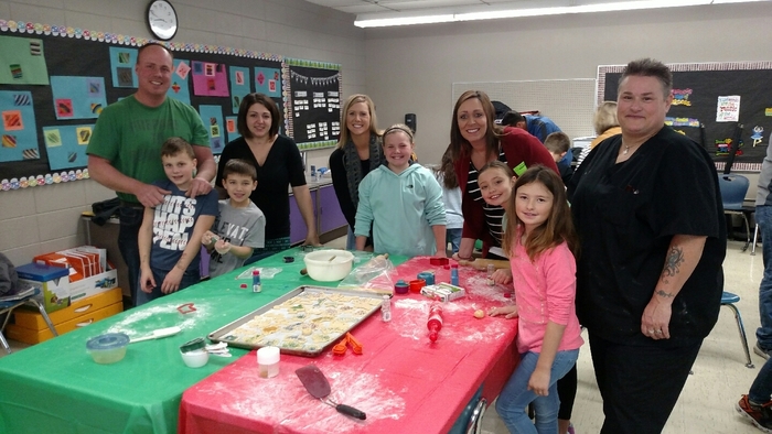 MCC 3rd graders enjoy making cookies with parents and grandparents.
