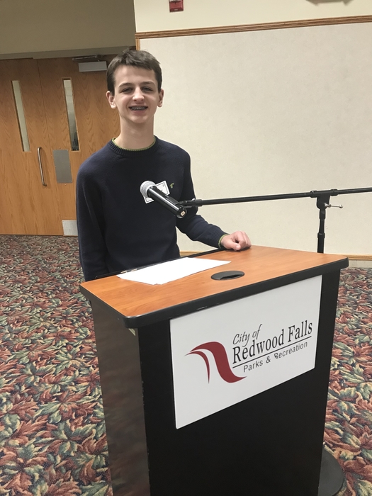 Tanner representing MCC High School and the Regional Spelling Bee